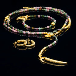 Grand freedom necklace, bracelet and lizard earrings.